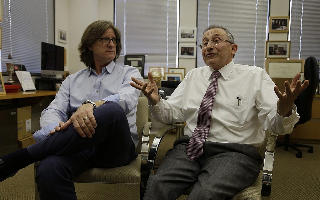 Illustrative: In this Friday, May 3, 2013 photo, founder Rabbi Marvin Hier, right, and Moriah Films director Richard Trank are seen during an interview at the Wiesenthal Center in Los Angeles. (AP Photo/Reed Saxon)