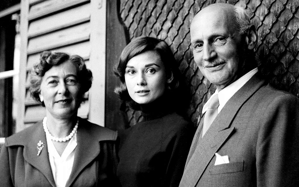In 1957, the stress of a day in Switzerland with Elfriede and Otto Frank is visible on Audrey Hepburn's face. He had asked her to portray his daughter Anne Frank in an upcoming film; she will tell him that, for a variety of reasons, she can’t. (Eva Schloss, photographer; Anne Frank House)