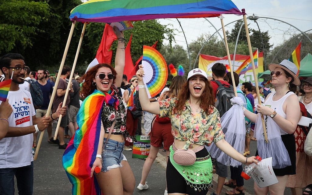 People take part in the annual Gay Pride parade in Jerusalem on June 6, 2019. (Noam Revkin Fenton/Flash90)