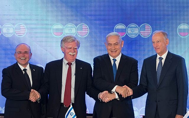 Prime Minister Benjamin Netanyahu, US national security adviser John Bolton (second left), Nikolai Patrushev, secretary of the Russian Security Council (right) and Israeli national security adviser Meir Ben-Shabbat (left) pose for a picture at a trilateral meeting at the Orient Hotel in Jerusalem on June 25, 2019. (Noam Revkin Fenton\Flash90)