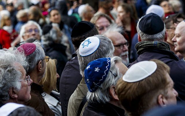 Participants wearing kippas at a rally in Berlin, April 25, 2018. (Carsten Koall/Getty Images via JTA)