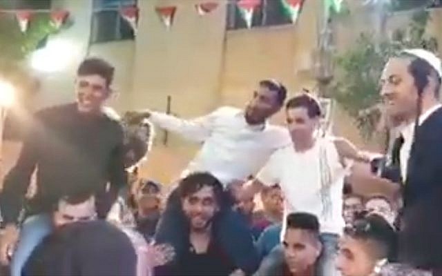 Several Jewish settlers reportedly showed up at a Palestinian West Bank wedding celebration on June 13, 2019, sparking outrage. (YouTube screenshot)