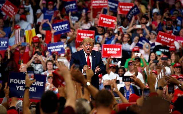 US President Donald Trump reacts to the crowd after speaking during his re-election kickoff rally at the Amway Center in Orlando, Florida, June 18, 2019. (AP Photo/Evan Vucci)