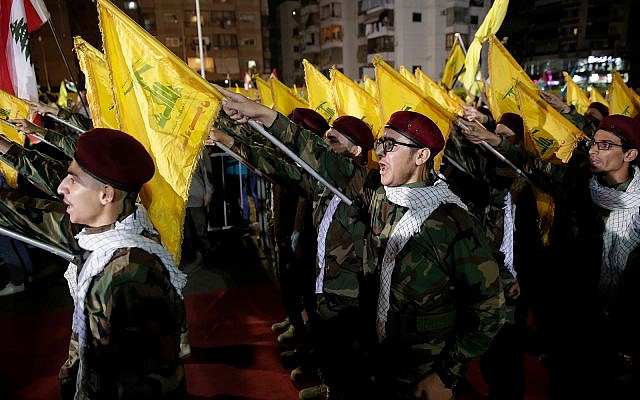 Hezbollah supporters take part in a rally to mark al-Quds day in Beirut, Lebanon, May 31, 2019. (AP Photo/Hassan Ammar)