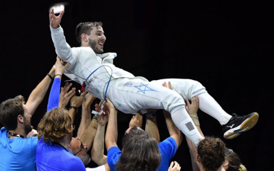 Israeli fencer Yuval Freilich is held aloft by his team after winning the gold at the European Fencing Championships in Dusseldorf, June 18, 2019. (Facebook photo/ European Fencing Confederation)