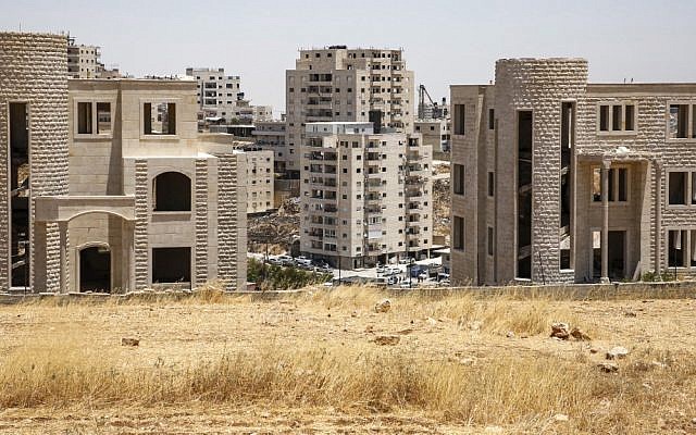 A picture from the Palestinian village of Beit Sahur in the West Bank shows Palestinian buildings which have been issued demolition notices, in the Sur Baher neighborhood of East Jerusalem, July 11, 2019. (Hazem Bader/AFP)