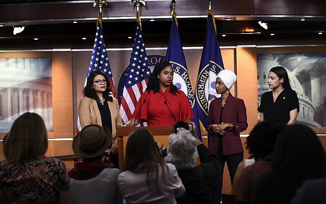US Representatives Ayanna Pressley (D-MA) speaks as, Ilhan Omar (D-MN)(2R), Rashida Tlaib (D-MI) (R), and Alexandria Ocasio-Cortez (D-NY) look on during a press conference, to address remarks made by US President Donald Trump earlier in the day, at the US Capitol in Washington, DC on July 15, 2019. (Brendan Smialowski / AFP)