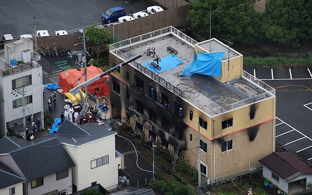 This aerial view shows the rescue and recover scene after a fire at an animation company building killed at least 33 people in Kyoto on July 18, 2019. (Photo by JIJI PRESS / JIJI PRESS / AFP)