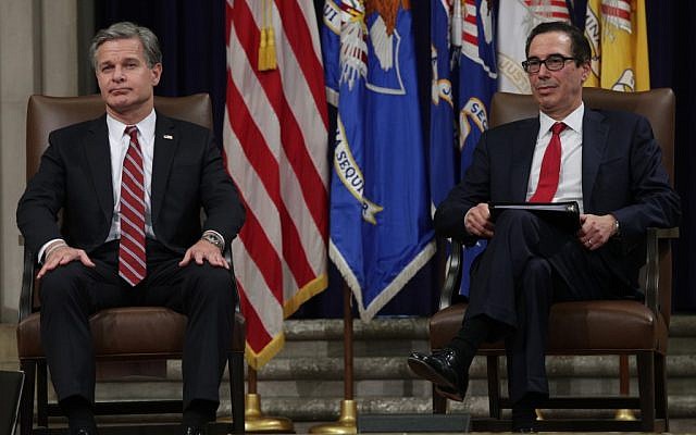 US.Secretary of the Treasury Steven Mnuchin and FBI Director Christopher Wray wait to be introduced during an Combating Anti-Semitism Summit at the Justice Department July 15, 2019 in Washington, DC.  (Alex Wong/Getty Images/AFP)