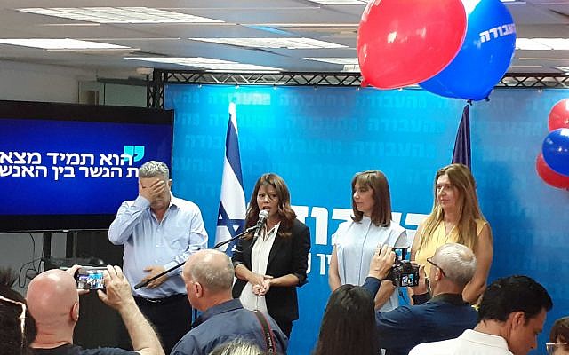 Labor leader Amir Peretz (L), Gesher leader Orly Levy-Abekasis (2L), and other Labor lawmakers at the party's campaign launch in Tel Aviv on July 24, 2019 (Omer Sharvit)