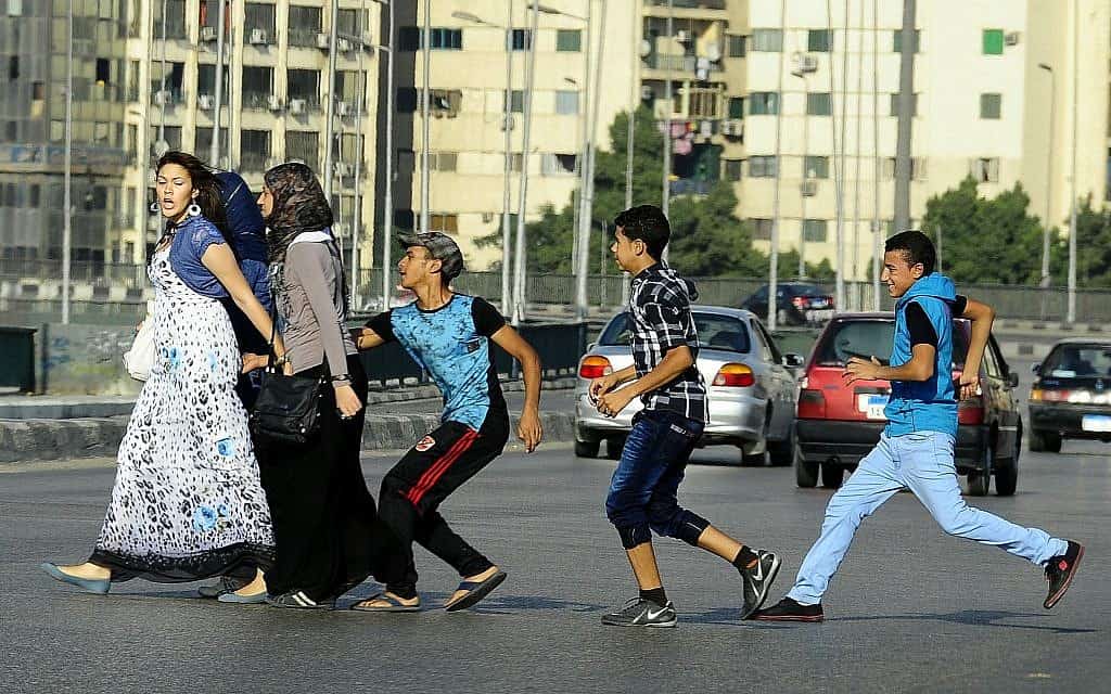 Youth sexually harass women in Egypt in 2017. (AP Photo/Ahmed Abdelatif, El Shorouk Newspaper)