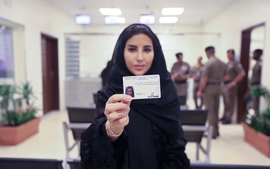 A Saudi woman displays her new driver's license in 2018. (Saudi Information Ministry/ via AP)