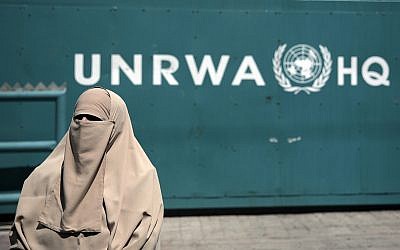 A Palestinian woman attends a demonstration outside the outside UNRWA's Headquarters in Gaza City, August 16, 2015. (AP Photo/Khalil Hamra)