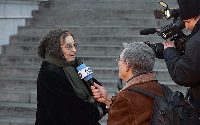 Hungarian philosopher Agnes Heller is interviewed by German Deutsche Welle TV company during an anti-goverment demonstration in front of the Hungarian Parliament building in Budapest, Hungary, Sunday, Feb. 1, 2015. (AP/MTI,Zoltan Mathe)