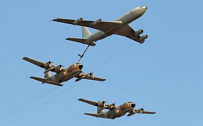 Illustrative - A Boeing 707 refueling plane and C-130 Hercules transport aircraft demonstrate aerial refueling at a graduation ceremony for soldiers who completed the Israeli Air Force's flight course, at the Hatzerim Air Base in the Negev Desert, June 28, 2016. (Ofer Zidon/Flash90)
