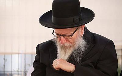Then-Deputy Health Minister Yaakov Litzman at the ceremony for the opening of a new branch of his Agudath Israel party, ahead of upcoming elections, in the northern city of Safed, July 4, 2019. (David Cohen/Flash90)