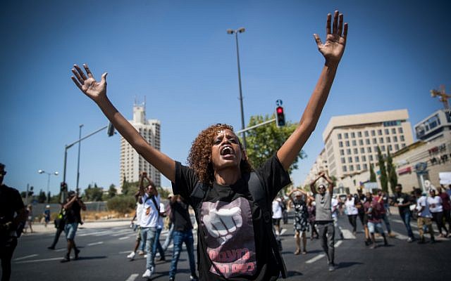 Ethiopian-Israelis and supporters demonstrate against police violence and discrimination following the death of 19-year-old Solomon Tekah, who was shot and killed in Haifa by an off-duty police officer; Jerusalem, July 15, 2019. (Yonatan Sindel/Flash90)