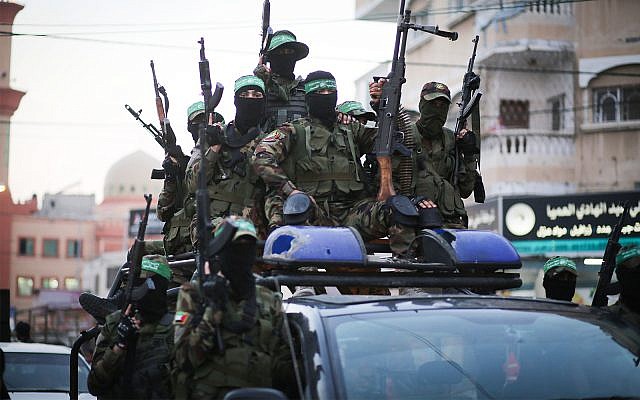 Members of the Izz-a-din al-Qassam Brigades, the military wing of the Islamist terror group Hamas, take part in a march in Gaza City, July 25, 2019. (Hassan Jedi/Flash90)