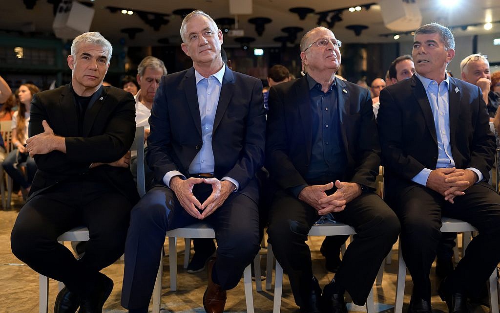 From left: Yair Lapid, Benny Gantz, Moshe Ya'alon, Gabi Ashkenazi of the Blue and White party at its official campaign launch in Shefayim, July 14, 2019. (Gili Yaari/Flash90)