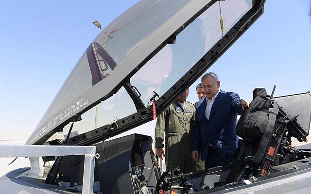 Prime Minister Benjamin Netanyahu inspecting an Adir F-35 stealth fighter at the Nevatim Air Force Base on July 9, 2019. (Ariel Hermoni/Defense Ministry)