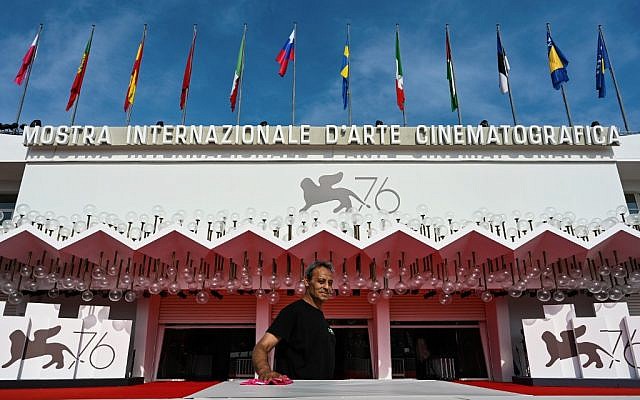An employee works outside the Palazzo del Cinema on August 28, 2019 on the opening day of the 76th Venice Film Festival at Venice Lido. (Alberto Pizzoli/AFP)