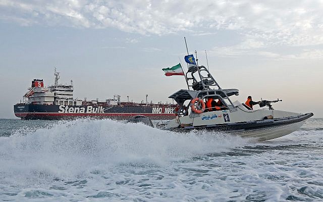 Iranian Revolutionary Guards patrol around the British-flagged tanker Stena Impero while it is anchored off the Iranian port city of Bandar Abbas, on July 21, 2019. (Hasan Shirvani / MIZAN NEWS AGENCY / AFP)