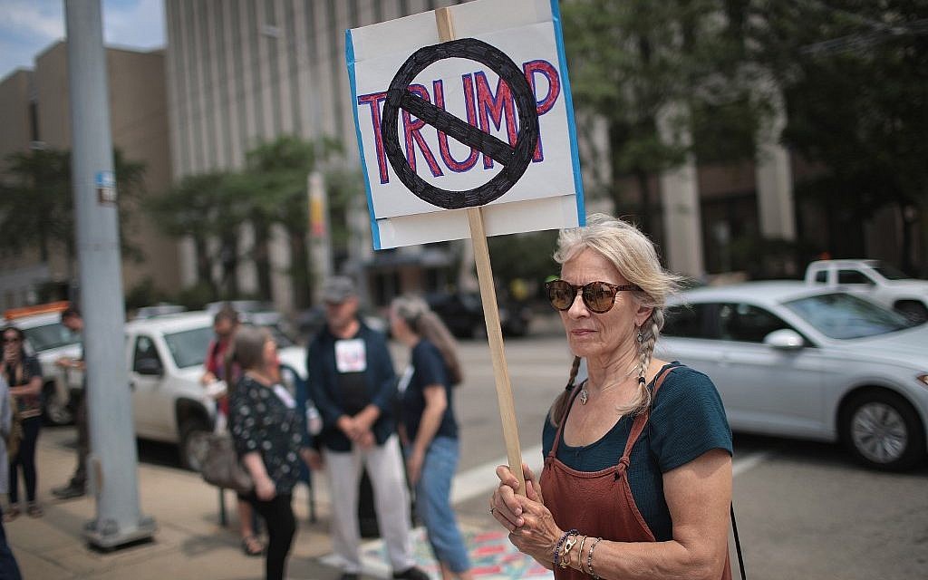 Demonstrators outside of the Dayton City Hall protest a planned visit of President Donald Trump on August 6, 2019 in Dayton, Ohio.  (Scott Olson/Getty Images/AFP)