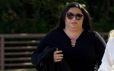 In this photo from July 16, 2019, Lee Elbaz arrives at federal court for jury selection in her trial in Greenbelt, Md. (AP Photo/Jose Luis Magana, File)