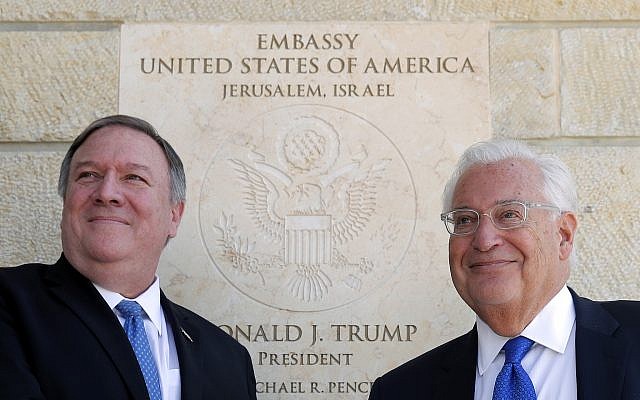 In this March 21, 2019 file photo, US Secretary of State Mike Pompeo and US Ambassador to Israel David Friedman stand next to the dedication plaque at the US Embassy in Jerusalem. (Jim Young/Pool photo via AP, File)