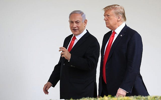 US President Donald Trump, right, and visiting Prime Minister Benjamin Netanyahu walk along the Colonnade of the White House in Washington, March 25, 2019. (Manuel Balce Ceneta/AP)
