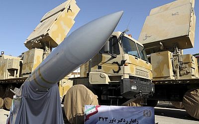 In this photo released by the official website of the office of the Iranian Presidency, the Iran-made Bavar-373 air defense missile system is seen after being unveiled by President Hassan Rouhani, Iran, August 22, 2019. (Iranian Presidency Office via AP)