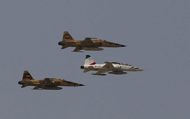 An illustrative photo of Iranian fighter jets flying over the mausoleum of late revolutionary founder Ayatollah Khomeini, during a military parade ceremony marking the anniversary of the start of the 1980-1988 Iraq-Iran war, just outside Tehran, Iran, September 22, 2009. (AP Photo/Vahid Salemi)