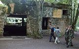 In this photo from July 17, 2004, tourists visit the ruins of Adolf Hitler's headquarters the 'Wolf's Lair' in Gierloz, northeastern Poland, where his chief of staff members made an unsuccessful attempt at Hitler's life on July 20, 1944 (AP Photo/Czarek Sokolowski, File)