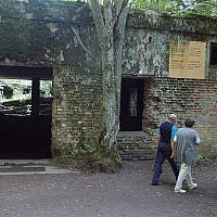 In this photo from July 17, 2004, tourists visit the ruins of Adolf Hitler's headquarters the 'Wolf's Lair' in Gierloz, northeastern Poland, where his chief of staff members made an unsuccessful attempt at Hitler's life on July 20, 1944 (AP Photo/Czarek Sokolowski, File)