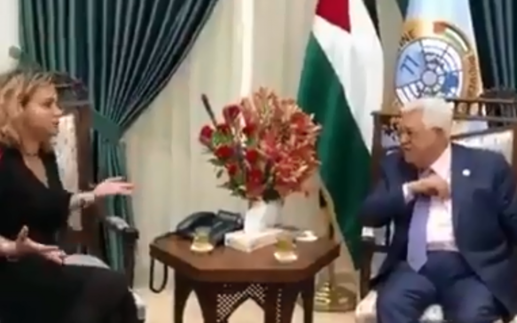 Palestinian Authority President Mahmoud Abbas speaks with Democratic Camp member Noa Rothman at the Mukatta compound in Ramallah on August 13, 2019. (Screen capture: Channel 13)