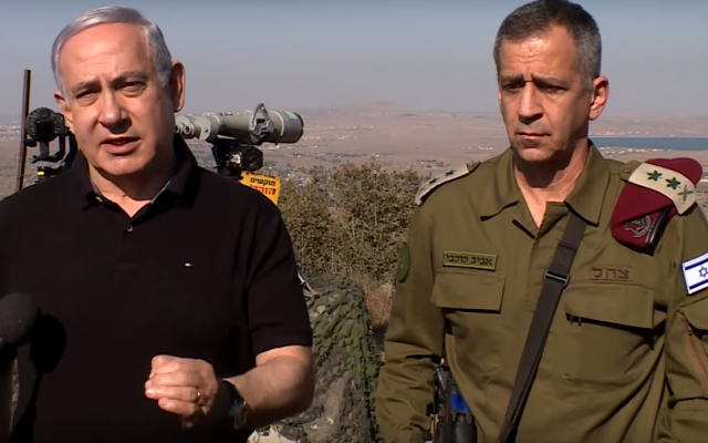 Prime Minister Benjamin Netanyahu (left) speaks to reporters during a tour of the Golan Heights with IDF Chief of Staff Aviv Kohavi on August 25, 2019. (YouTube/Screen capture)