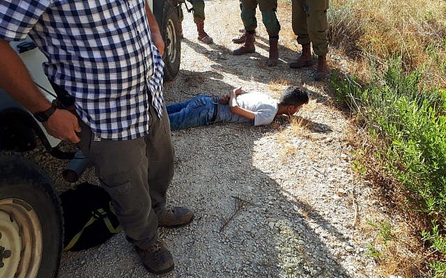 A Palestinian suspect detained by security forces in the West Bank who was found to be carrying a knife, August 25, 2019. (Rescuers Without Borders.)