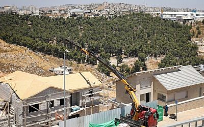 Illustrative: Construction work in the Dagan neighborhood of the settlement of Efrat, in the West Bank on July 22, 2019. (Gershon Elinson/Flash90)