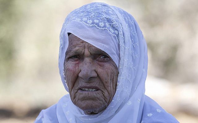 Muftia Tlaib, the maternal grandmother of US Congresswoman Rashida, is pictured outside her home in the village of Beit Ur al-Fauqa West Bank, August 15, 2019. (Abbas Momani/AFP)
