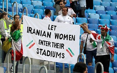 Supporters of Iranian women hold a banner at a match between Morocco and Iran at the 2018 in St. Petersburg, Russia, June 15, 2018. (AP Photo/Themba Hadebe)