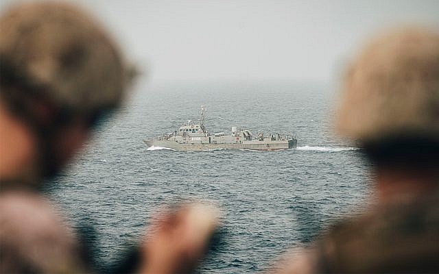 US Marines monitor an Iranian navy vessel from the USS John P. Murtha in the Strait of Hormuz, August 12, 2019. (US Marine Corps photo by Staff Sgt. Donald Holbert/Released)