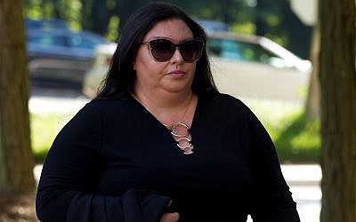 Lee Elbaz arrives at federal court for jury selection in her trial in Greenbelt, Maryland, July 16, 2019. (AP Photo/Jose Luis Magana)