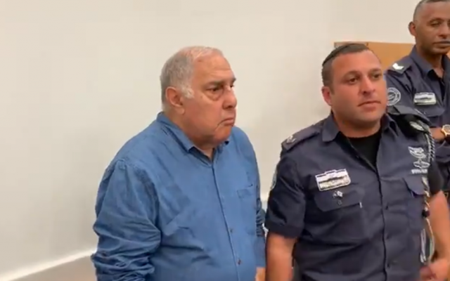 Viktor Katan appears at the Central District Court in Lod on August 14, 2019, where he is indicted for the murder of Ofir Hasdai. (Screen capture: Twitter)