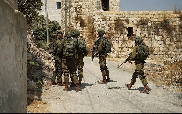 Israeli troops operate in the West Bank on August 23, 2019, following a deadly terror bombing near the Dolev settlement. (Israel Defense Forces)