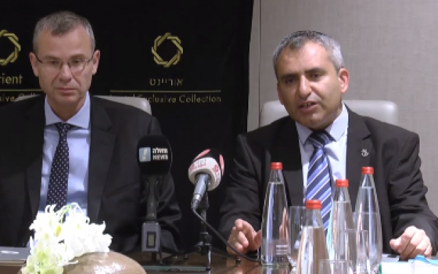 Ministers Yariv Levin (L) and Ze'ev Elkin of Likud speak to the media ahead of negotiations with the Blue and White party, September 27, 2019 (video screenshot)