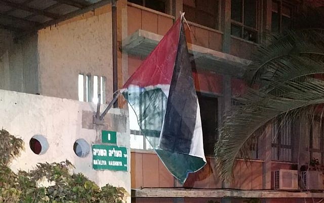 A makeshift Palestinian flag put up outside the Petah Tikva municipality building on September 4, 2019. (Courtesy)
