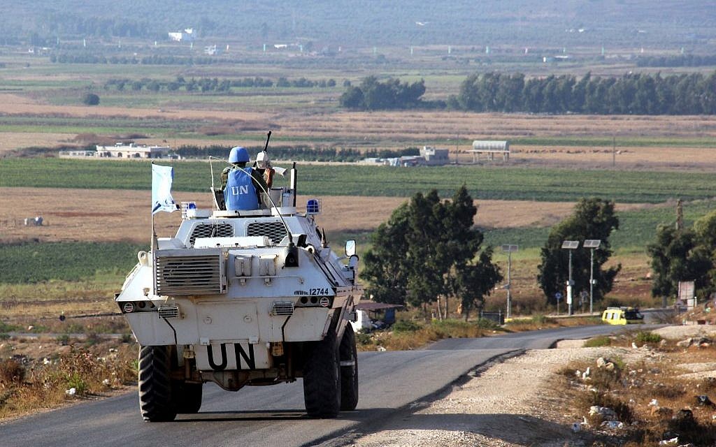 Vehicles belonging to UN peacekeepers drive along a road along the Israel-Lebanon border near the southern Lebanese town of Kfar Kila on September 1, 2019. (Ali Dia/AFP)