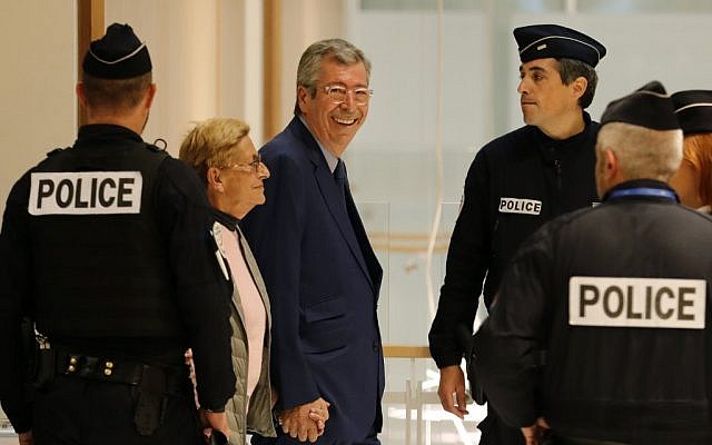 Mayor of Levallois-Perret Patrick Balkany (C,R) and his wife first deputy mayor Isabelle Balkany prosecuted with alleged aggravated tax fraud arrive on September 13, 2019 for the rendering of the verdict at the Paris courthouse. (Thomas SAMSON / AFP)