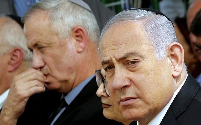Prime Minister Benjamin Netanyahu (R), and Benny Gantz (L), leader of Blue and White party, at a memorial ceremony for late president Shimon Peres, at Mount Herzl in Jerusalem on September 19, 2019. (Gil Cohen-Magen/AFP)