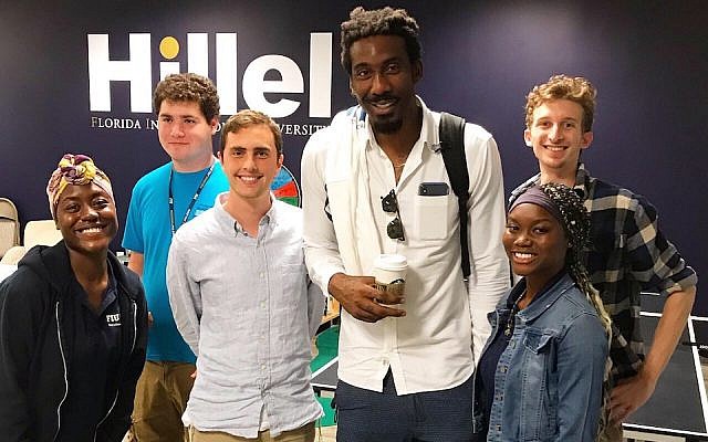 Amar'e Stoudemire, tallest, is leading an initiative to connect Jewish and African-American students at Florida International University. (Courtesy of FIU Hillel via JTA)